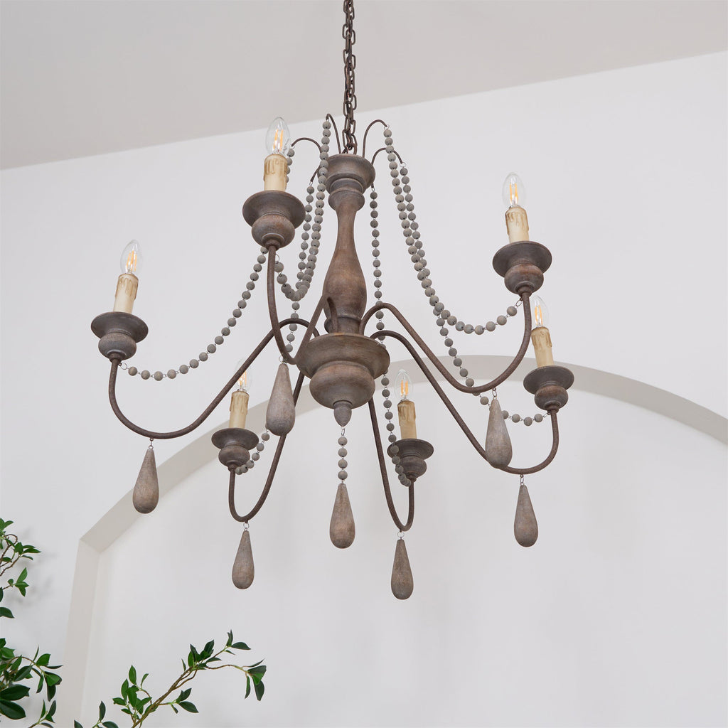 Lampadario a perline in stile candela