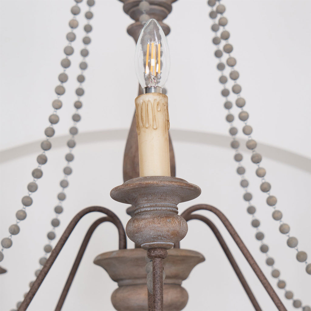 Lampadario a perline in stile candela