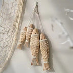 Appendi pesce in legno costiero