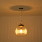 Lampada a sospensione contemporanea con orbita in vetro trasparente a ribasso 1 luce
