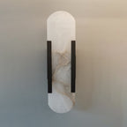 Applique ovale in marmo con illuminazione ambientale LED soffusa