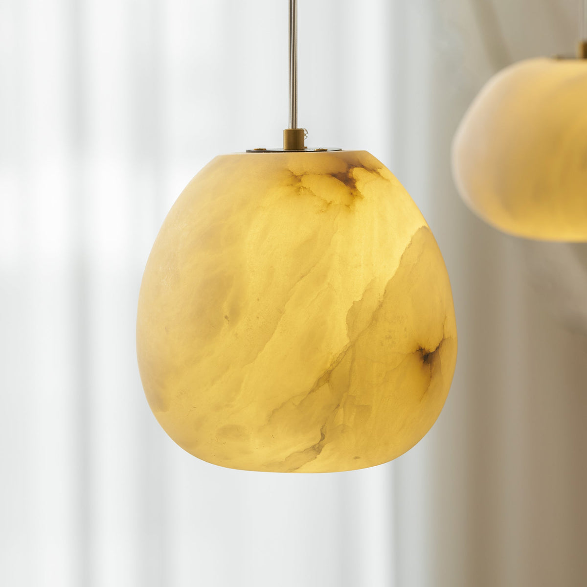 Lampada a sospensione Pebbles in Alabastro