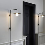 Lampada da parete Gea con braccio oscillante