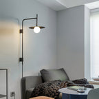 Lampada da parete Gea con braccio oscillante