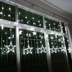 Illuminazione Natalizia a LED a Tenda con Stelle – Luce Bianca Calda
