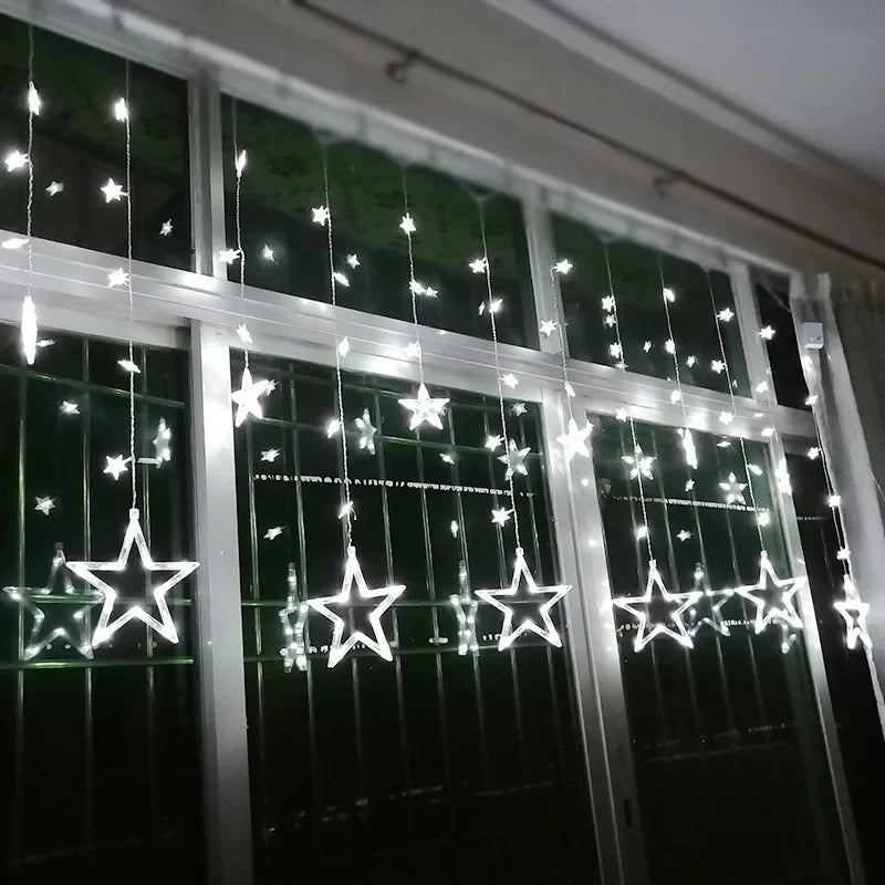 Illuminazione Natalizia a LED a Tenda con Stelle – Luce Bianca Calda