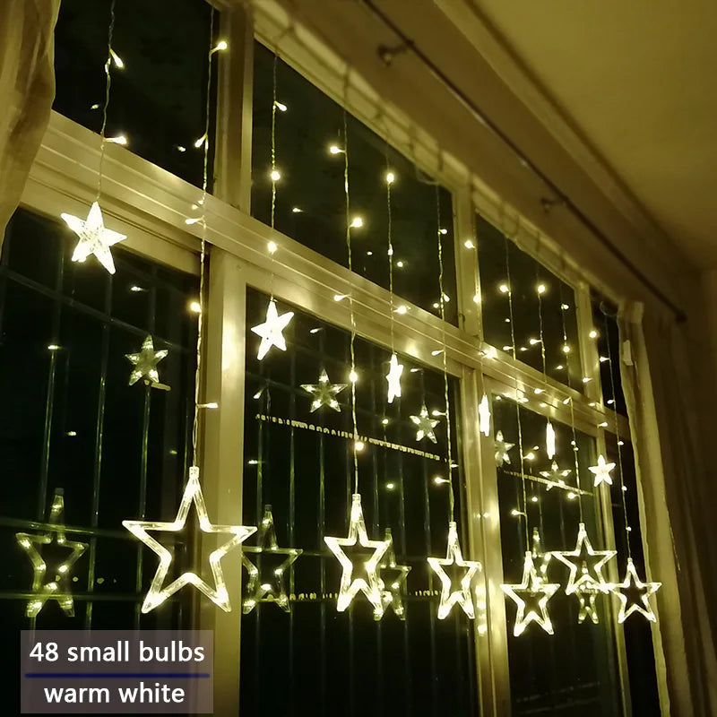 Illuminazione Natalizia a LED a Tenda con Stelle – Luce Bianca Calda