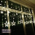Illuminazione Natalizia a LED a Tenda con Stelle – Luce Bianca Calda