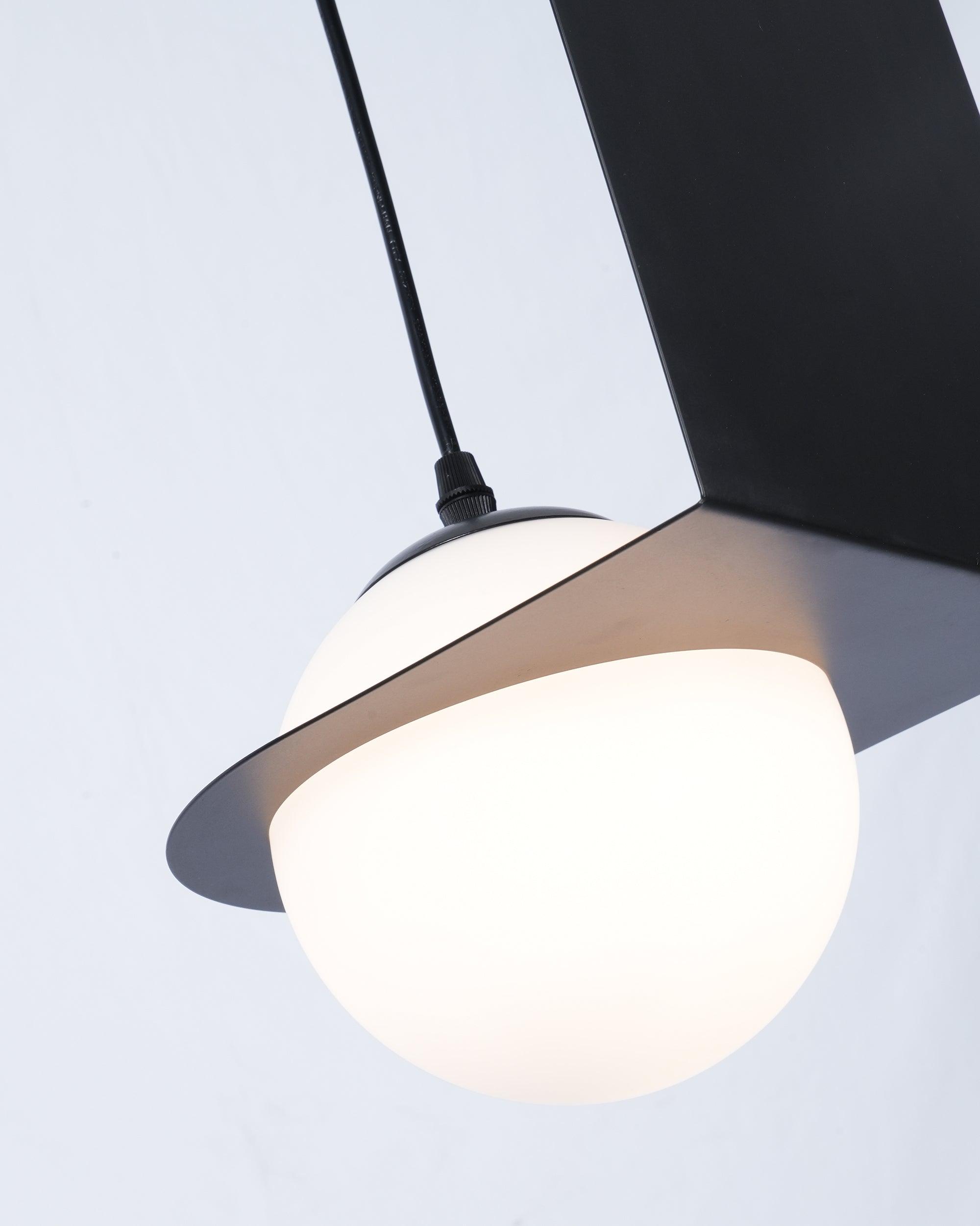 Lampada a sospensione in vetro nero Selan