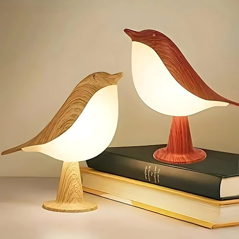 Lampada da tavolo a forma di uccello con corpo retroilluminato