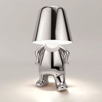 Lampada da tavolo metallica con forma artistica riflettente