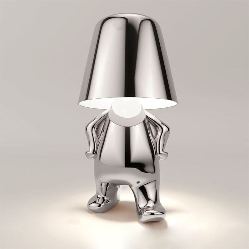 Lampada da tavolo metallica con forma artistica riflettente
