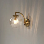 IllumeSphere - Lampada da parete moderna in vetro per un'atmosfera luminosa