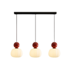 Lampada a sospensione in vetro opale con cappuccio sferico colorato