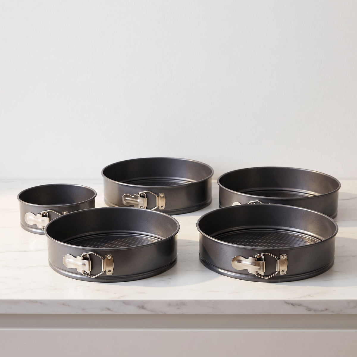 Set di 4 Stampo a Molla Krumble – Stampo Rotondo di 12, 18, 24 e 26 cm