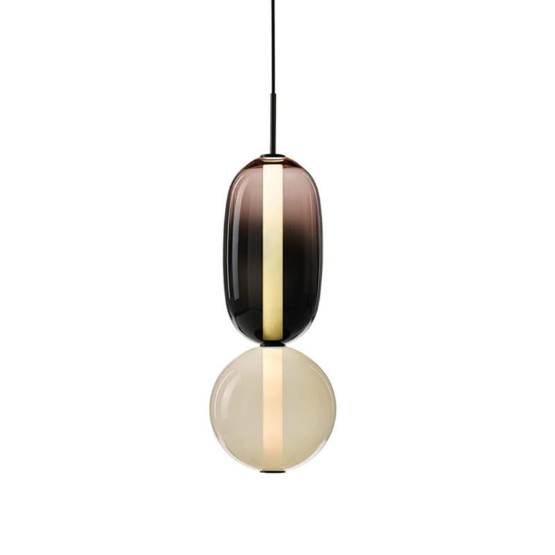 Lampada a sospensione Syro in vetro caramellato