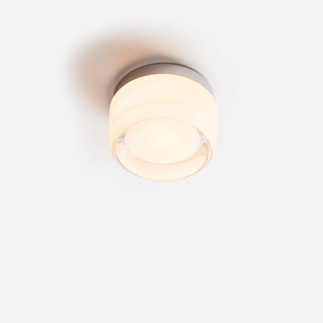 Lampada da parete in vetro compatta