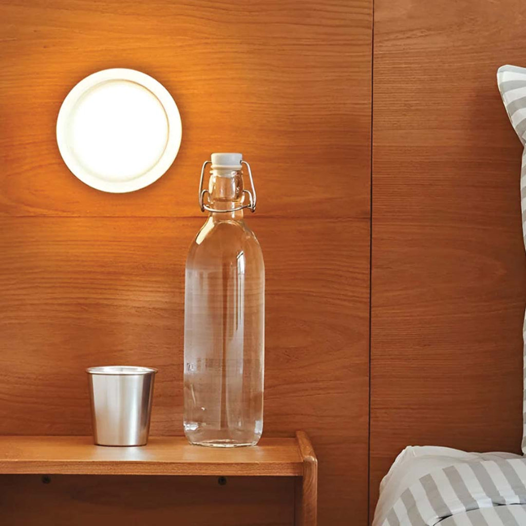 Lampada da parete in vetro compatta