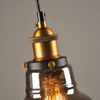 Lampada a sospensione in vetro colorato con attacco in ottone