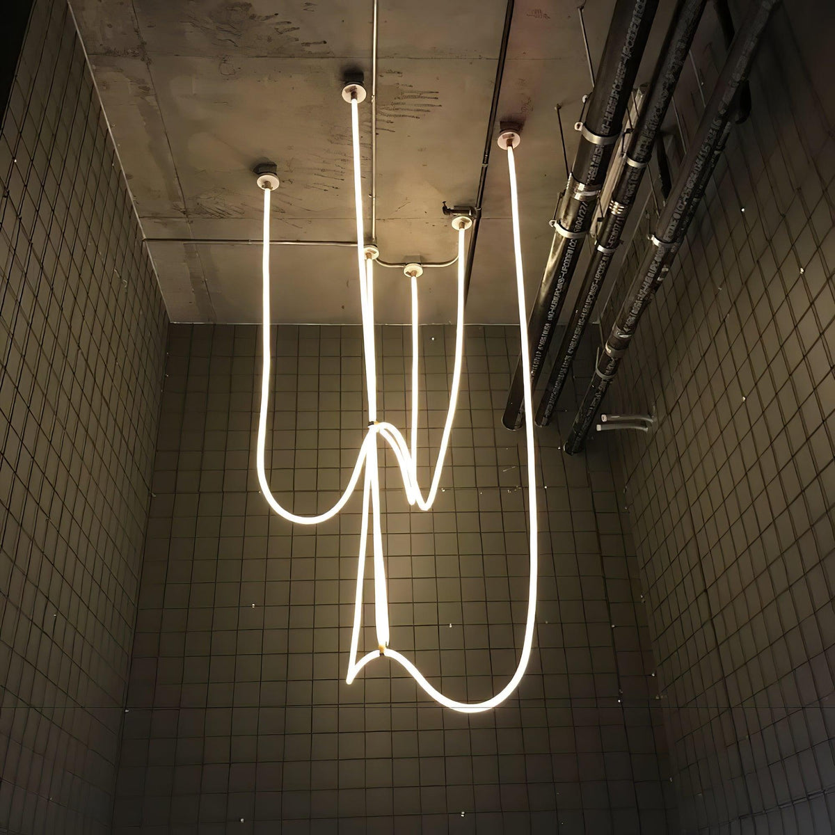 Lampada a sospensione a curva flessibile