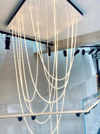 Lampada a sospensione a curva flessibile