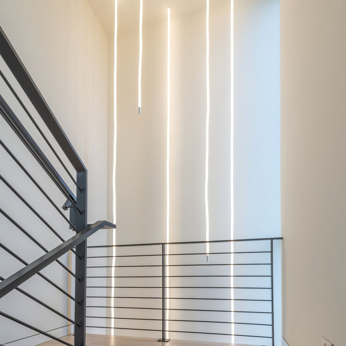 Lampada a sospensione a curva flessibile
