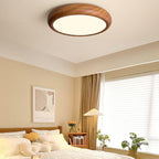 Lampada da soffitto rotonda con venature in legno