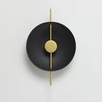 Applique murale dorata minimalista luminosità calda.
