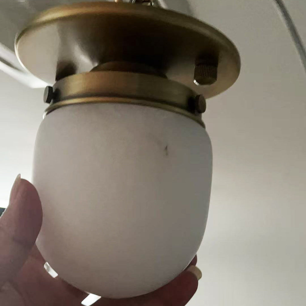 Lampada da soffitto in alabastro a forma di proiettile