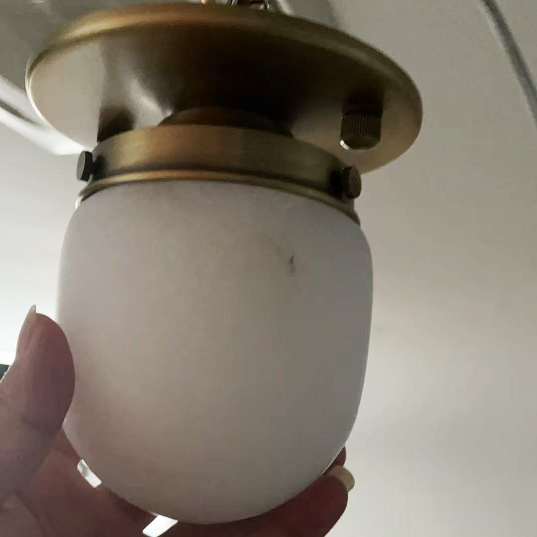 Lampada da soffitto in alabastro a forma di proiettile