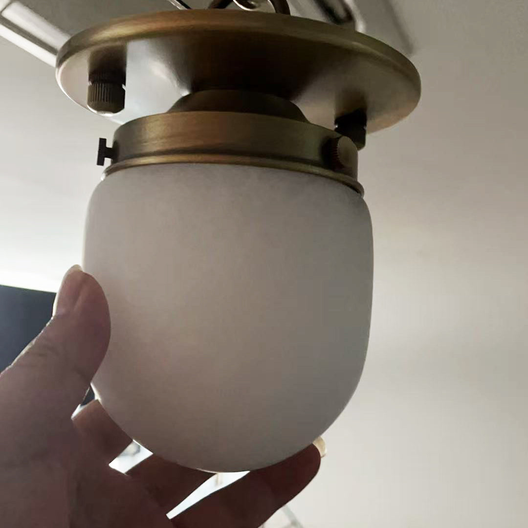 Lampada da soffitto in alabastro a forma di proiettile
