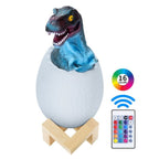 DinoGlow - Lampada da letto a forma di dinosauro con luce a cambio colore e telecomando
