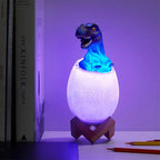 DinoGlow - Lampada da letto a forma di dinosauro con luce a cambio colore e telecomando