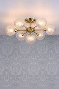 Lampada da soffitto semi-flush Laura Ashley Atherton in ottone satinato e vetro