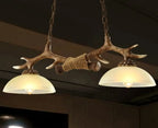 Lampadario in legno di cervo