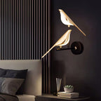 Moderna lampada da parete LED a forma di uccello