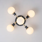 Lampada a soffitto semi-flush in vetro globulare Sputnik moderna nera e dorata a 5 luci