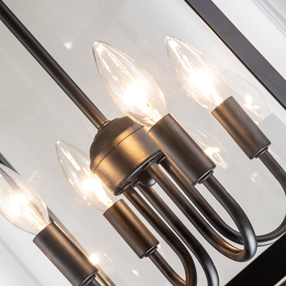 Lampadario a lanterna in vetro cilindrico con 4 luci in stile industriale