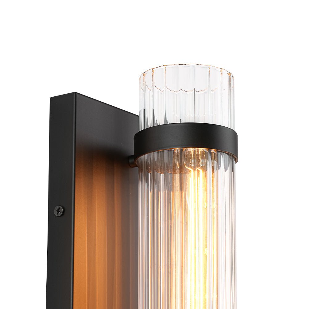 Applique da bagno moderna in vetro cilindrico fluted con 1 luce