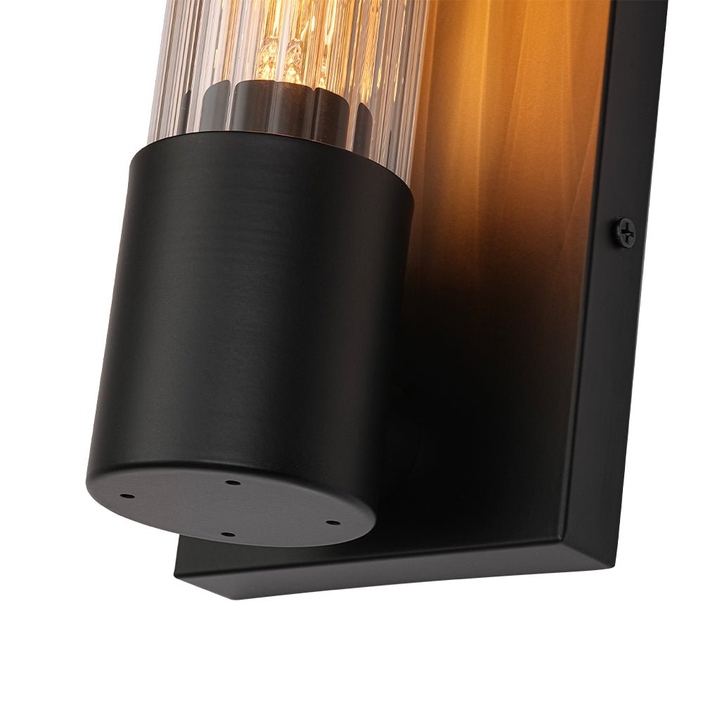Applique da bagno moderna in vetro cilindrico fluted con 1 luce