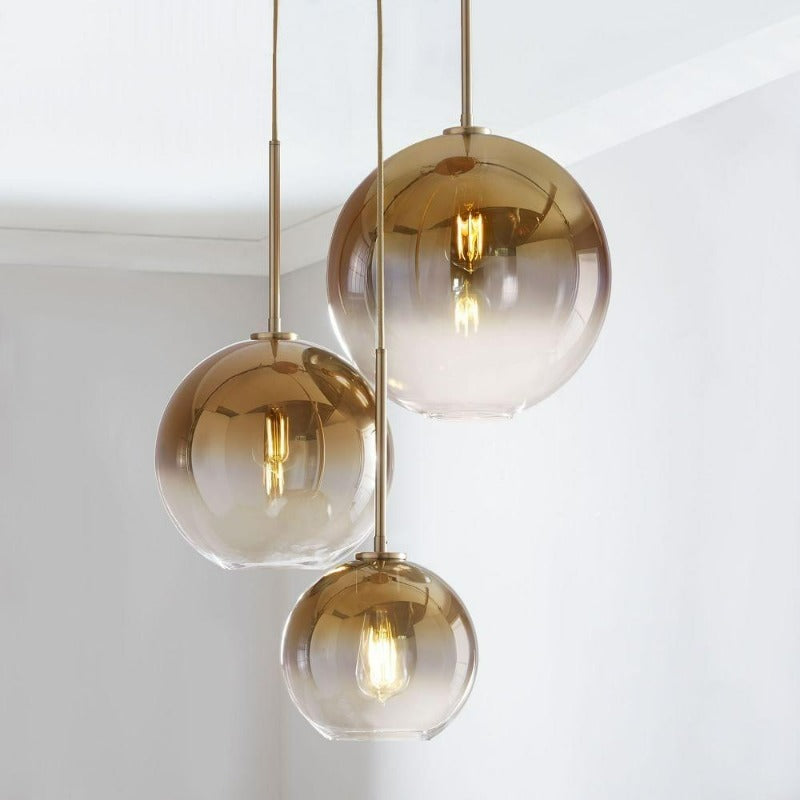 Lampada a sospensione con sfera di vetro | Design moderno in ottone