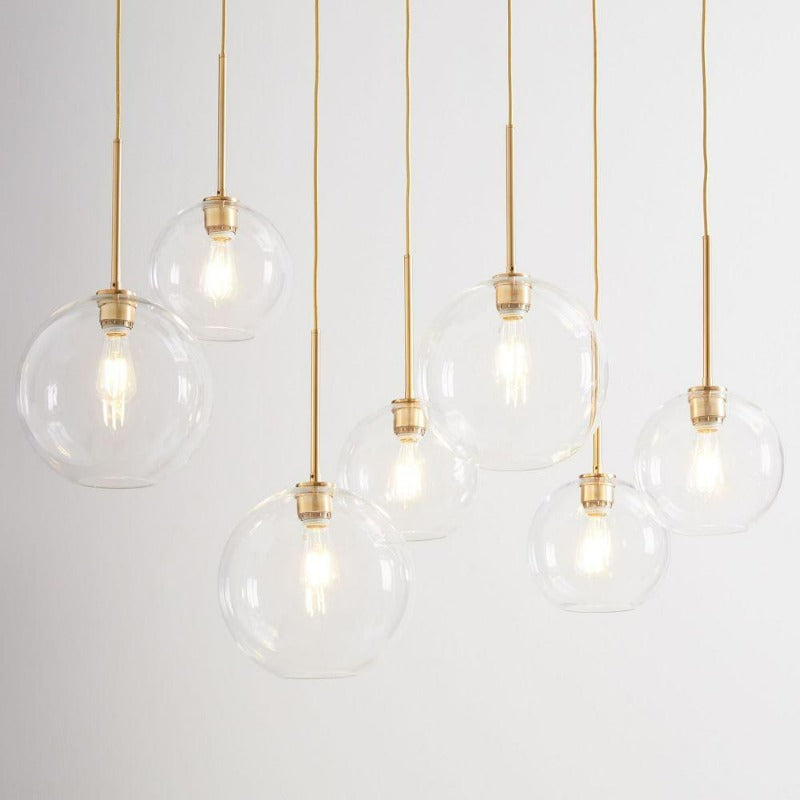 Lampada a sospensione con sfera di vetro | Design moderno in ottone
