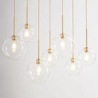 Lampada a sospensione con sfera di vetro | Design moderno in ottone