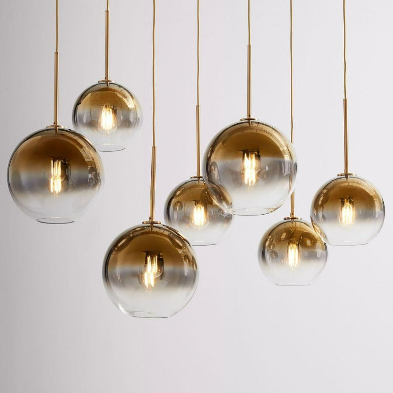 Lampada a sospensione con sfera di vetro | Design moderno in ottone