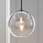 Lampada a sospensione con sfera di vetro | Design moderno in ottone