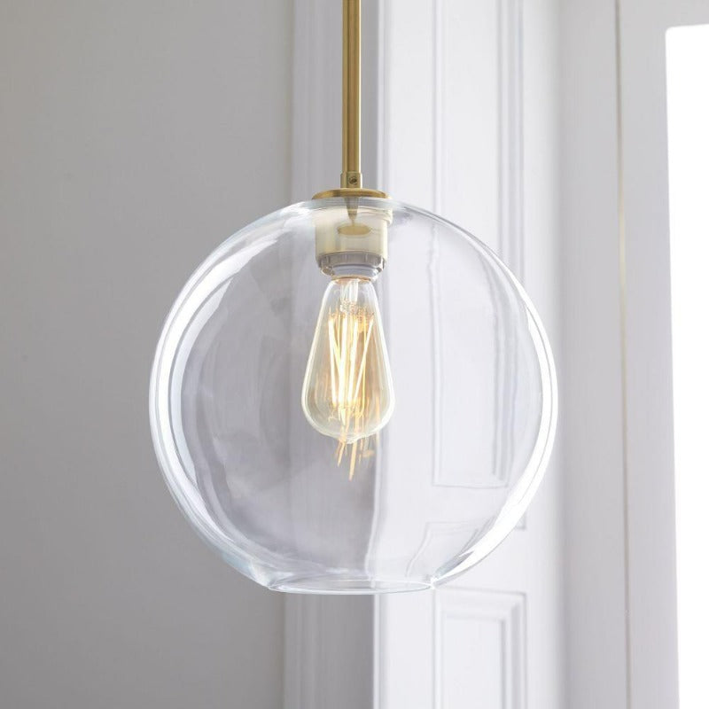 Lampada a sospensione con sfera di vetro | Design moderno in ottone